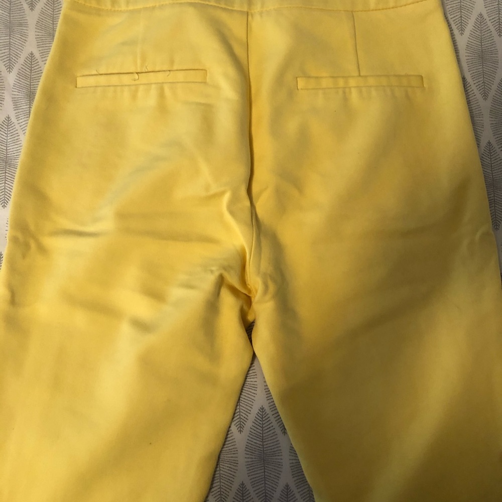Elastic pants with silver zippers